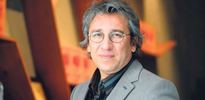 Can Dündar başörtüyü hazmedemedi