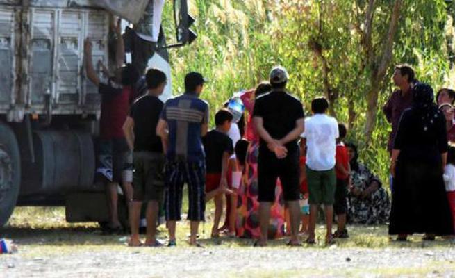 Plaja kamyonla gelenler mülteci sanıldı
